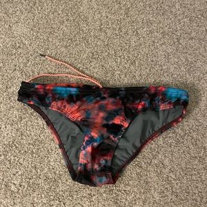 Jolyn Andy bikini bottoms. Black, pink and blue tie dye.